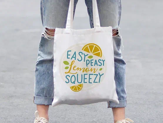 Bag embroidered with "Easy Peasy Lemon Squeezy" text 